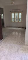 Premium apartment interior — bedroom with marble flooring